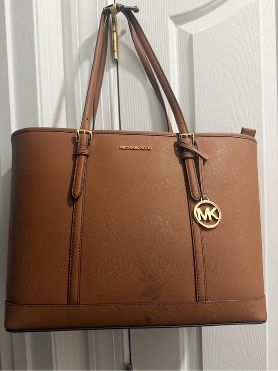 Michael Kors Handbags - Michael Kors Brown Leather Tote with Gold MK Charm